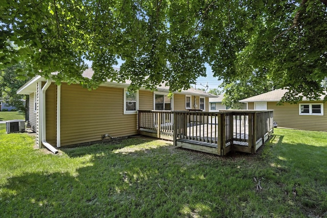 11439 Heights Dr NW, Coon Rapids, MN 55433 - rear view of house featuring a lawn and a deck
