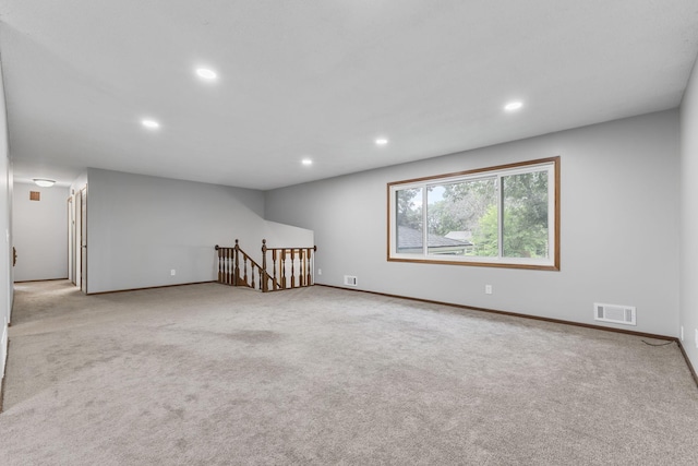 11460 Goldenrod St NW, Coon Rapids, MN 55448 - carpeted empty room featuring recessed lighting