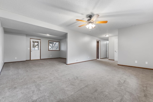 11460 Goldenrod St NW, Coon Rapids, MN 55448 - unfurnished room with a ceiling fan and carpet flooring