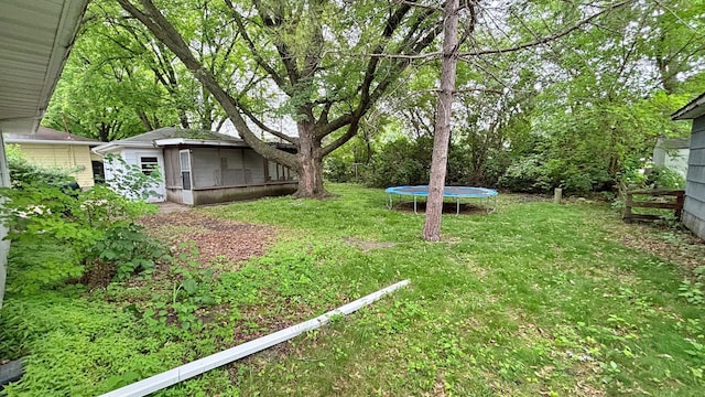 122 Plainview Ave, Mankato, MN 56001 - view of grassy yard with a trampoline