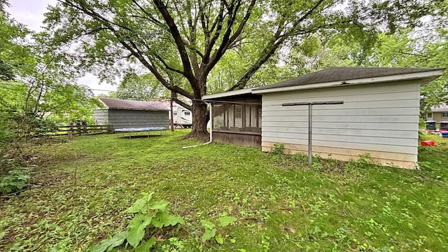 122 Plainview Ave, Mankato, MN 56001 - view of grassy yard featuring a trampoline