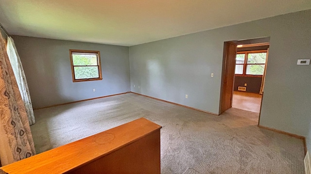 122 Plainview Ave, Mankato, MN 56001 - carpeted spare room featuring plenty of natural light