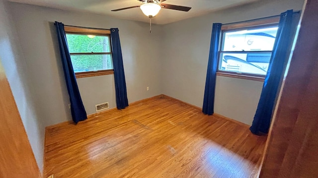 122 Plainview Ave, Mankato, MN 56001 - unfurnished room with light wood-style floors and ceiling fan