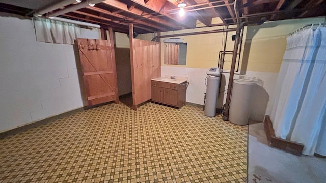 122 Plainview Ave, Mankato, MN 56001 - unfinished basement featuring a water softener and light flooring