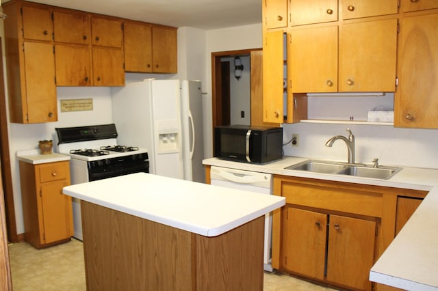 34497 Quiken Rd, Motley, MN 56466 - kitchen featuring white appliances, light countertops, light floors, a center island, and brown cabinetry
