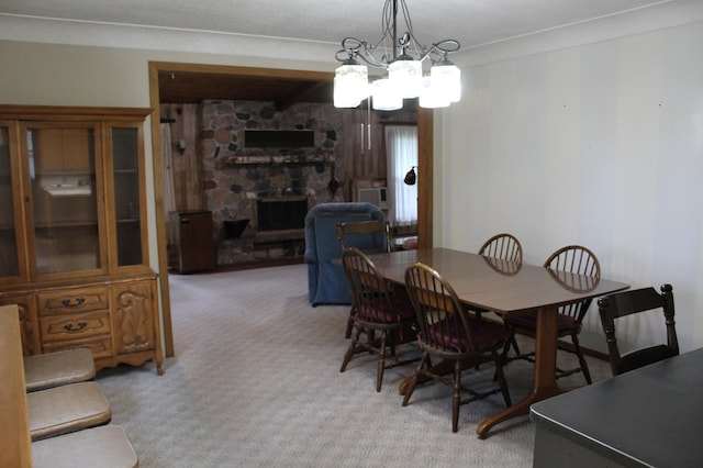 34497 Quiken Rd, Motley, MN 56466 - dining area with light colored carpet, a fireplace, and a chandelier