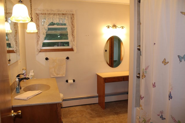 34497 Quiken Rd, Motley, MN 56466 - bathroom with vanity and a baseboard heating unit