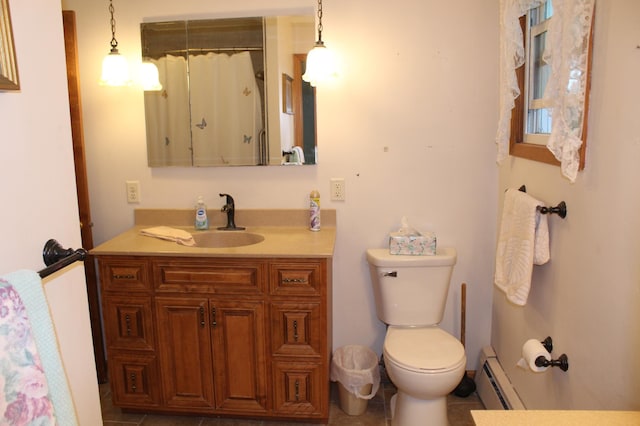 34497 Quiken Rd, Motley, MN 56466 - full bathroom with a baseboard radiator and vanity