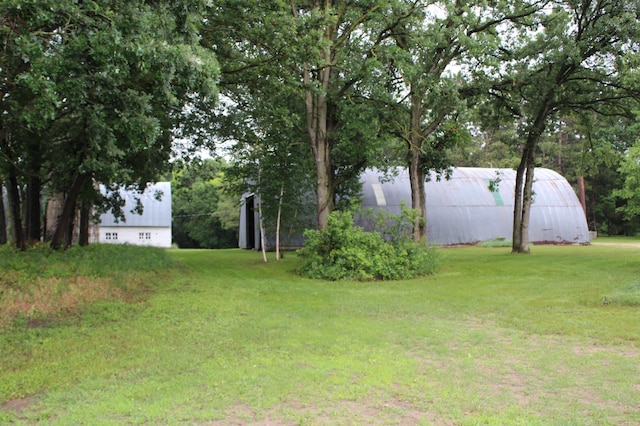 34497 Quiken Rd, Motley, MN 56466 - view of green lawn featuring an outbuilding and an outdoor structure