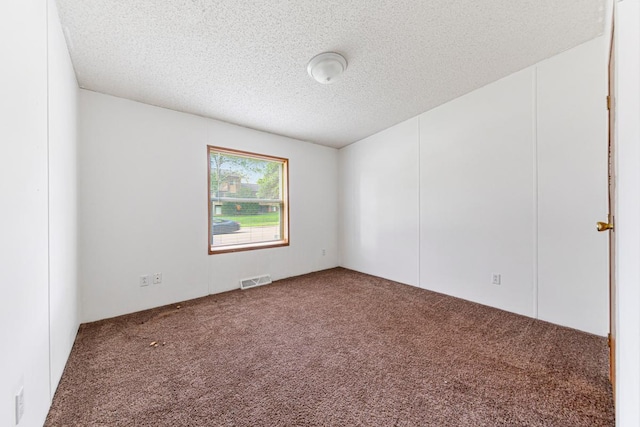 108 Hilton Ct, Mankato, MN 56001 - carpeted empty room with a textured ceiling