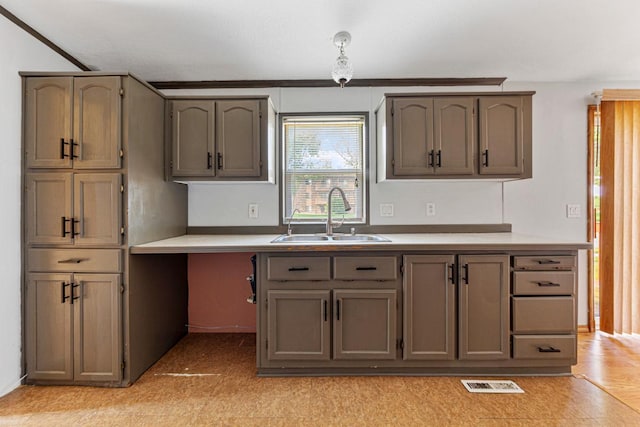 108 Hilton Ct, Mankato, MN 56001 - kitchen featuring a sink and light countertops