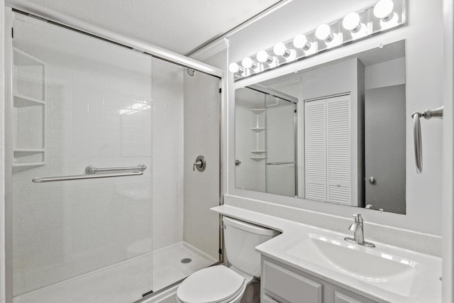 66 9th St E Unit 1712, Saint Paul, MN 55101 - bathroom featuring a stall shower, vanity, a textured ceiling, and a closet