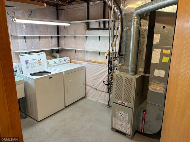 101 Hillside St, Big Lake, MN 55309 - laundry room with separate washer and dryer and heating unit