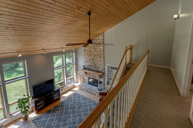 20428 Pheasant Trl, Brainerd, MN 56401 - living area with wooden ceiling, a ceiling fan, plenty of natural light, lofted ceiling, and a fireplace