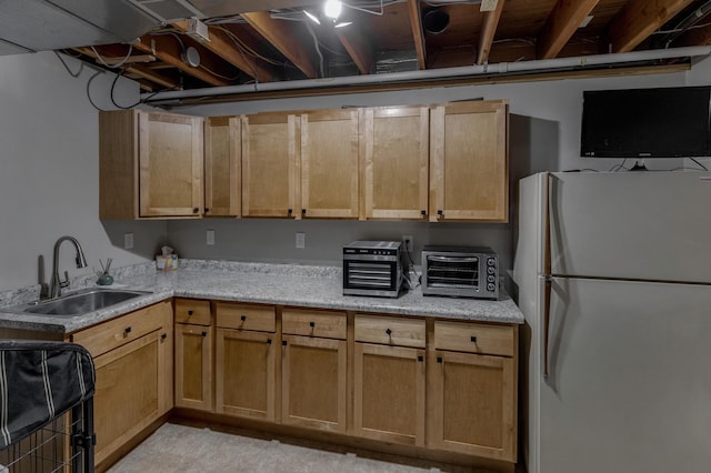 20428 Pheasant Trl, Brainerd, MN 56401 - kitchen with freestanding refrigerator, stove, and light stone countertops