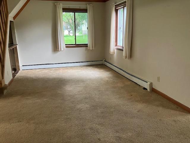 358 Cypress Ave, New Richland, MN 56072 - bonus room with carpet flooring and a baseboard radiator