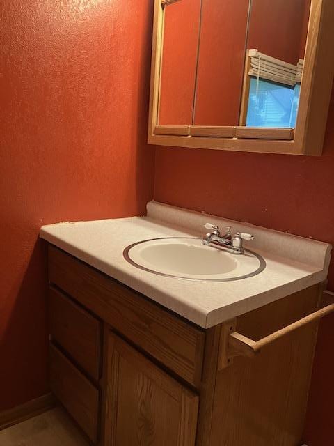 358 Cypress Ave, New Richland, MN 56072 - bathroom featuring vanity