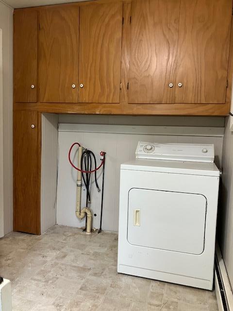 358 Cypress Ave, New Richland, MN 56072 - laundry room featuring washer / dryer and cabinet space
