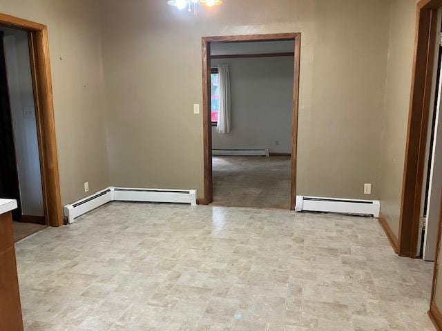 358 Cypress Ave, New Richland, MN 56072 - unfurnished room featuring a baseboard radiator