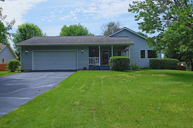 13334 Silverod Ct NW, Andover, MN 55304 - ranch-style home featuring driveway, covered porch, a garage, and a front lawn