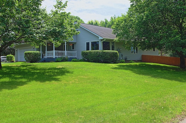 13334 Silverod Ct NW, Andover, MN 55304 - view of front of home featuring covered porch, an attached garage, and roof with shingles