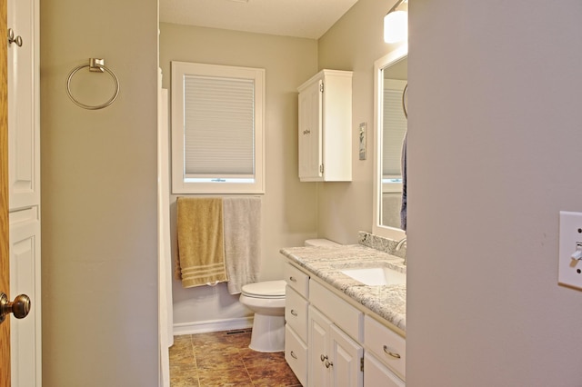13334 Silverod Ct NW, Andover, MN 55304 - bathroom featuring vanity and toilet