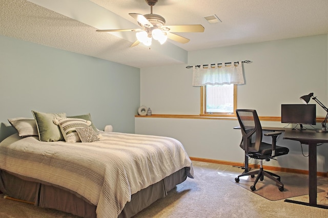 13334 Silverod Ct NW, Andover, MN 55304 - carpeted bedroom with a ceiling fan, a desk, and a textured ceiling