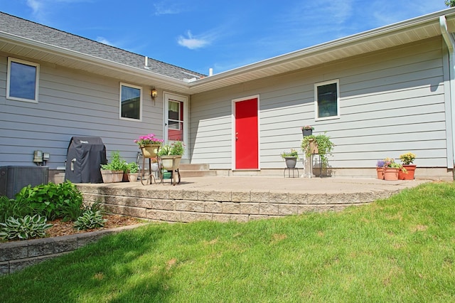 13334 Silverod Ct NW, Andover, MN 55304 - rear view of property featuring a patio area and a lawn