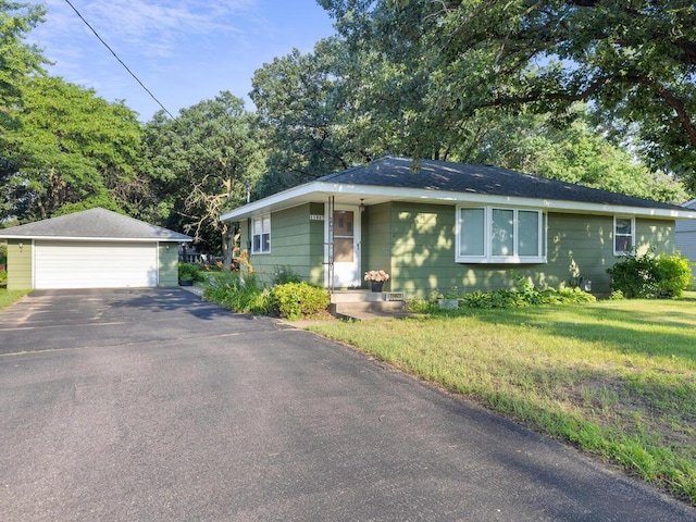 11827 Douglas Dr N, Champlin, MN 55316 - ranch-style home with a garage, an outbuilding, and a front lawn