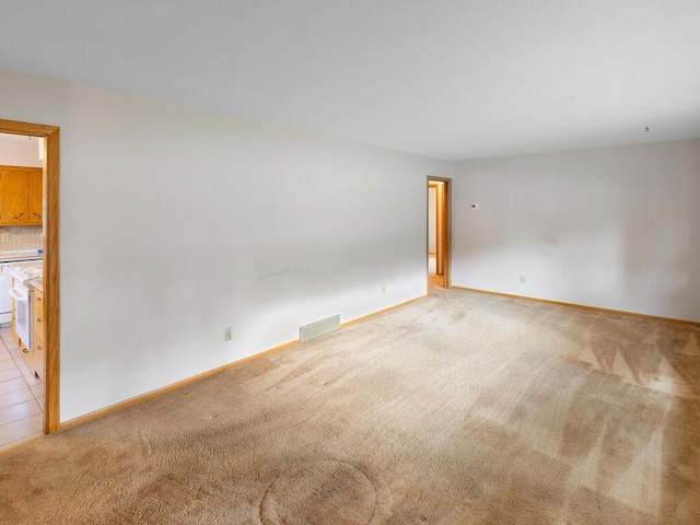 11827 Douglas Dr N, Champlin, MN 55316 - carpeted empty room with baseboards
