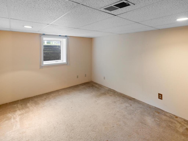 11827 Douglas Dr N, Champlin, MN 55316 - below grade area featuring carpet flooring and a paneled ceiling