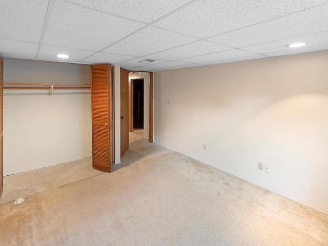 11827 Douglas Dr N, Champlin, MN 55316 - unfurnished bedroom with carpet flooring, a closet, a paneled ceiling, and recessed lighting