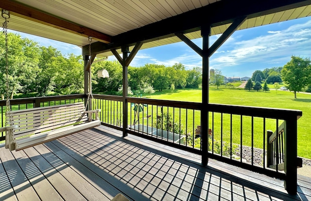 2161 170th St, New Richmond, WI 54017 - wooden terrace with a lawn and view of wooded area