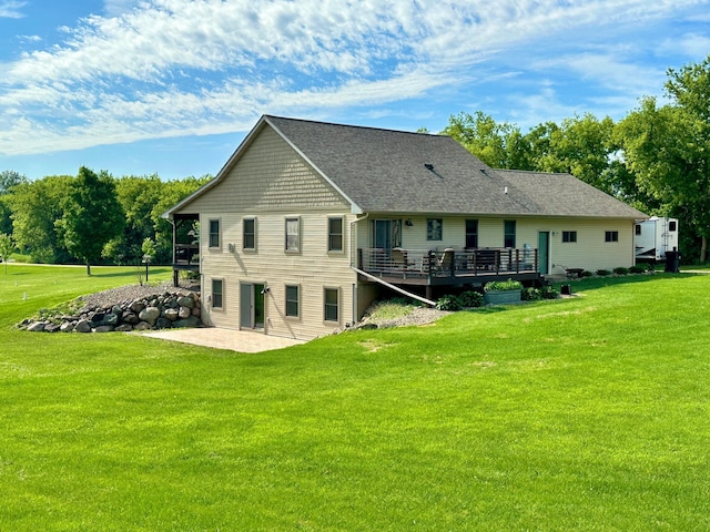 2161 170th St, New Richmond, WI 54017 - rear view of property with a patio, a lawn, and a wooden deck