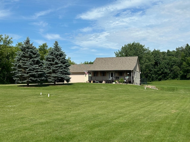 2161 170th St, New Richmond, WI 54017 - view of front of house featuring covered porch and a front yard
