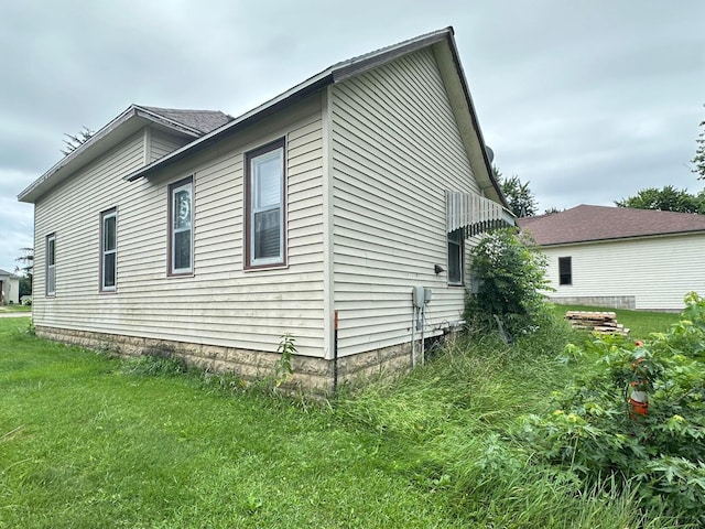 203 4th St, Beaver Creek, MN 56116 - view of property exterior featuring a yard
