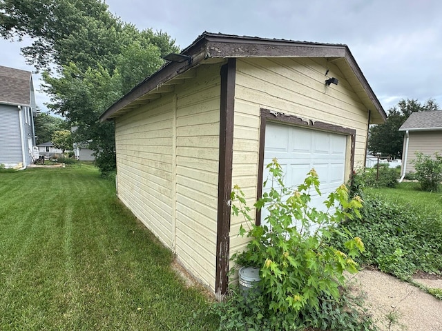 203 4th St, Beaver Creek, MN 56116 - view of side of property featuring an outdoor structure and a yard