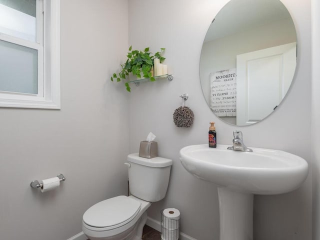 910 Burton Cir, Montrose, MN 55363 - bathroom with toilet and baseboards