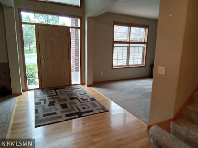 6640 Fountain Ct N, Maple Grove, MN 55311 - entryway with wood finished floors and healthy amount of natural light