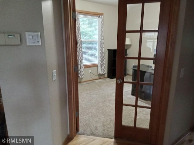 6640 Fountain Ct N, Maple Grove, MN 55311 - hall featuring french doors and baseboards