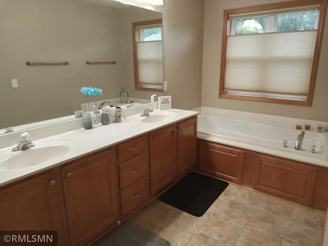 6640 Fountain Ct N, Maple Grove, MN 55311 - bathroom with a bath and double vanity