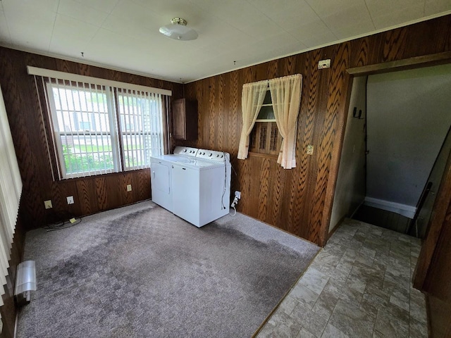 808 5th St SW, Pipestone, MN 56164 - washroom featuring washer and clothes dryer and wood walls