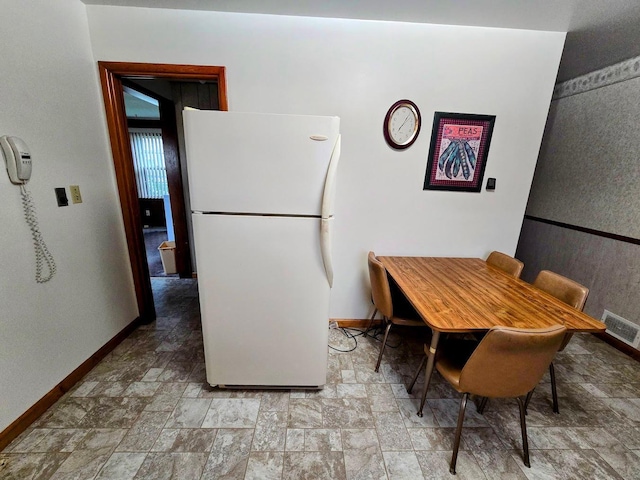 808 5th St SW, Pipestone, MN 56164 - dining space featuring stone finish flooring