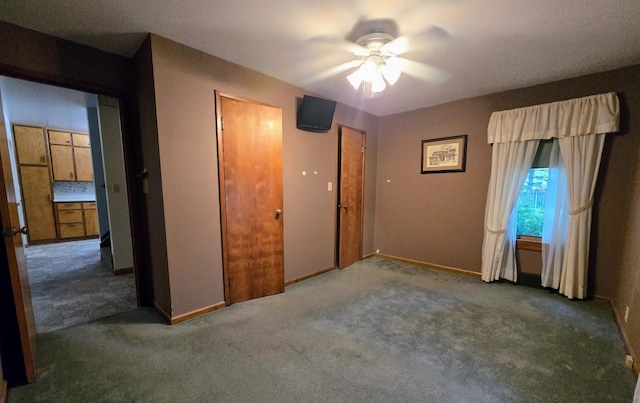 808 5th St SW, Pipestone, MN 56164 - unfurnished bedroom with carpet and ceiling fan