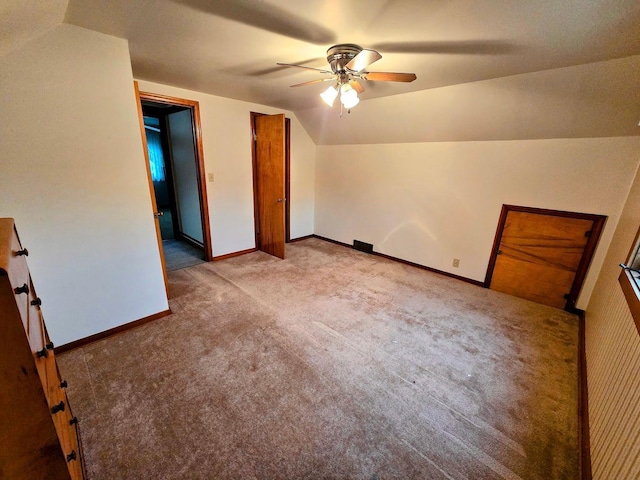 808 5th St SW, Pipestone, MN 56164 - additional living space with a ceiling fan, carpet, and lofted ceiling