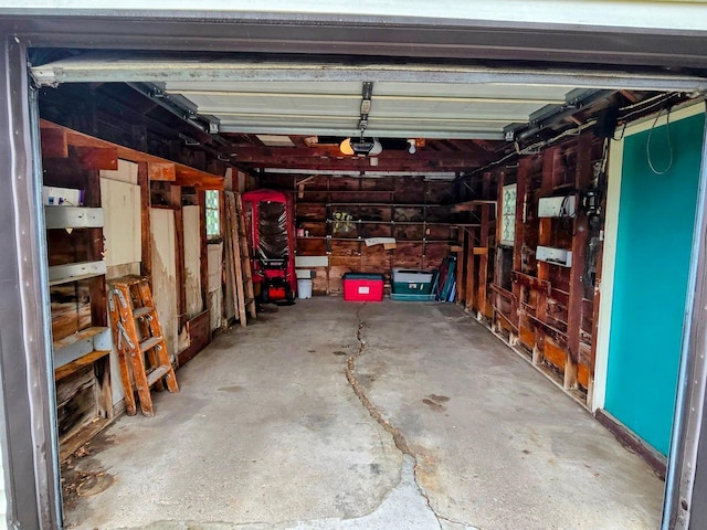 808 5th St SW, Pipestone, MN 56164 - garage featuring a garage door opener