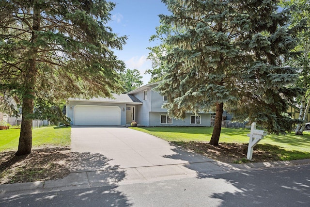 6520 Nathan Ln N, Maple Grove, MN 55369 - view of front facade with an attached garage, driveway, and a front yard