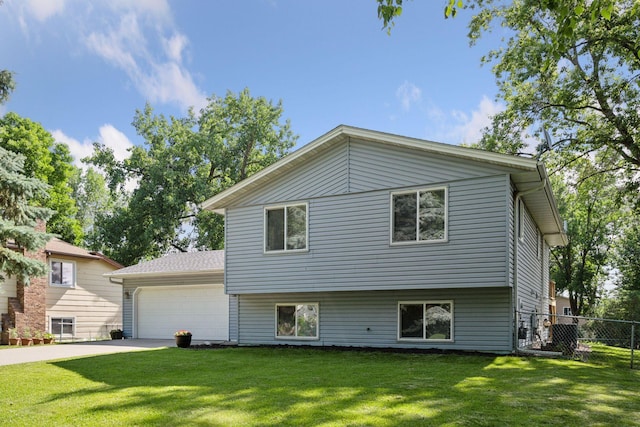 6520 Nathan Ln N, Maple Grove, MN 55369 - view of front of house with driveway and an attached garage