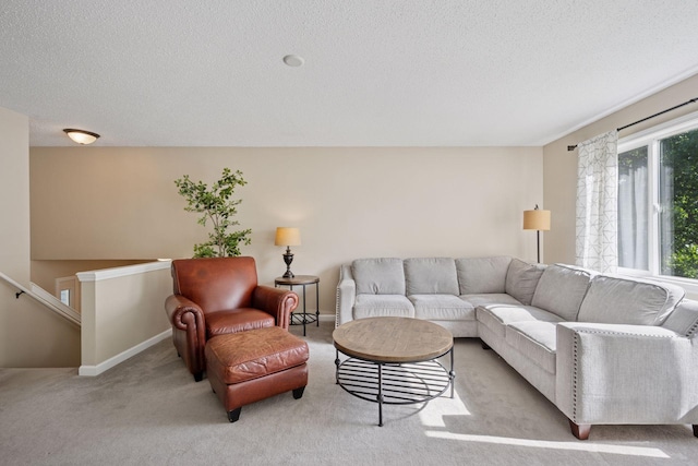 6520 Nathan Ln N, Maple Grove, MN 55369 - living area featuring a textured ceiling and light colored carpet
