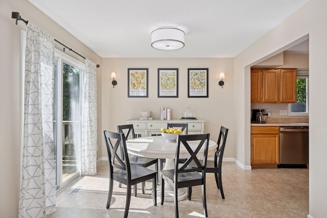 6520 Nathan Ln N, Maple Grove, MN 55369 - dining space featuring baseboards